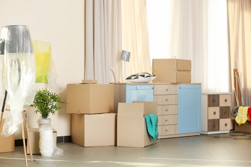 Moving service team loading items for a Maidahill relocation