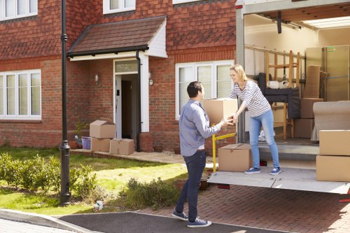 Professional same day removals in Maidahill with moving van and packed boxes