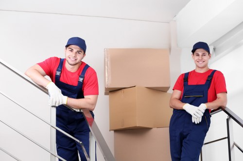 Moving truck and packed boxes for home moves in Maidahill