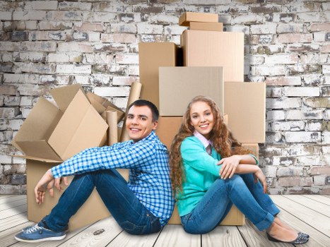 Professional house removals planning in Maidahill with moving boxes and furniture