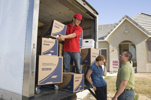 Staff reviewing moving risks before a man and van job