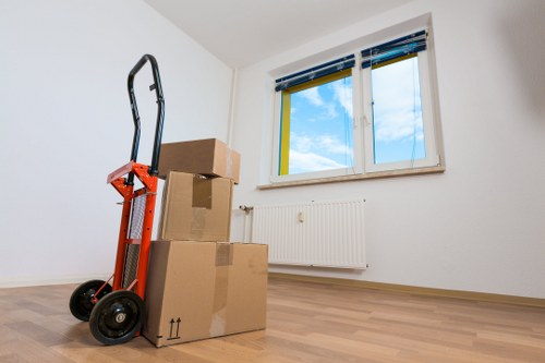 Loading furniture and boxes into a van for a Maida Hill move