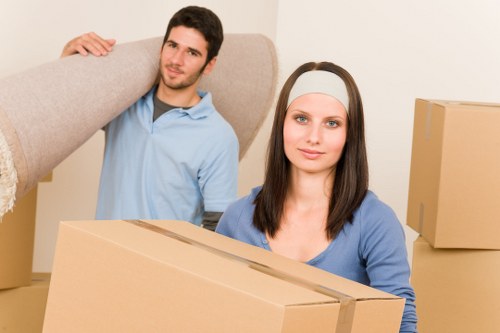 Packed boxes and furniture ready for a Maida Hill relocation