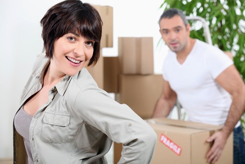 Professional movers loading furniture for a local Maidahill move