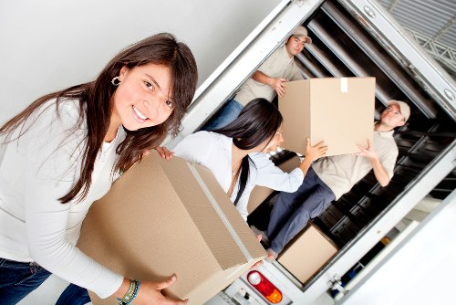 Local house removalists in Maidahill transporting boxes and furniture