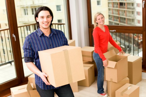 Organised packing boxes prepared for home removals in Maidahill
